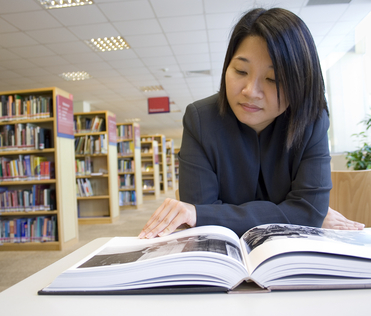 Woman reading in the library