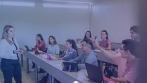 Group of students in a classroom with digital device