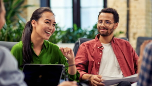 Image of a group of young professionals working together